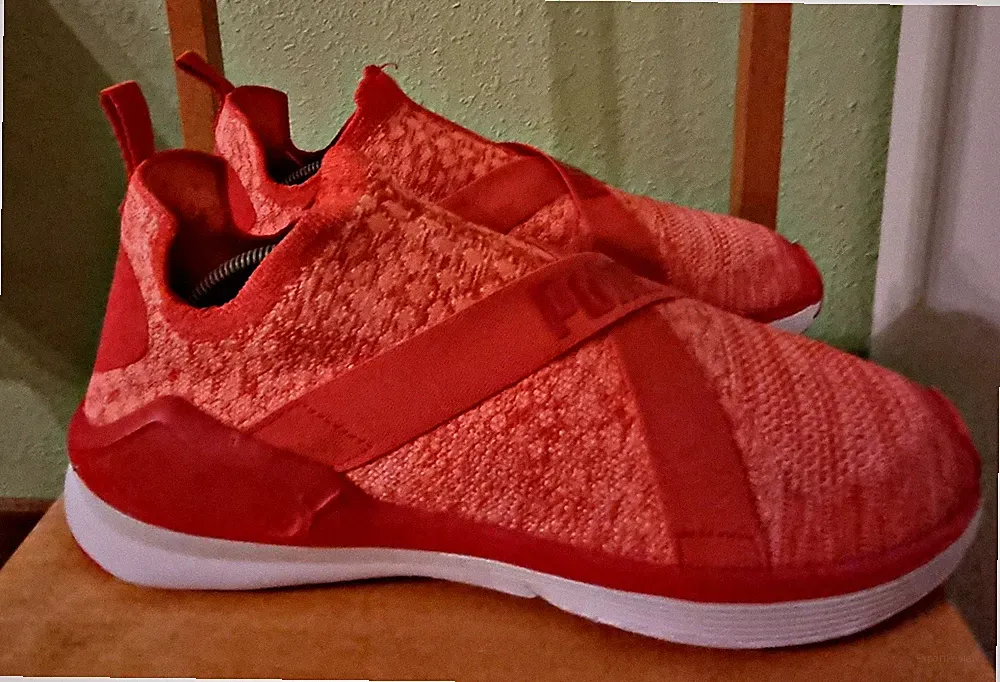 PUMA Sportschuhe, Laufschuhe, Freizeitschuhe, Sneaker.Orange Gr. 41